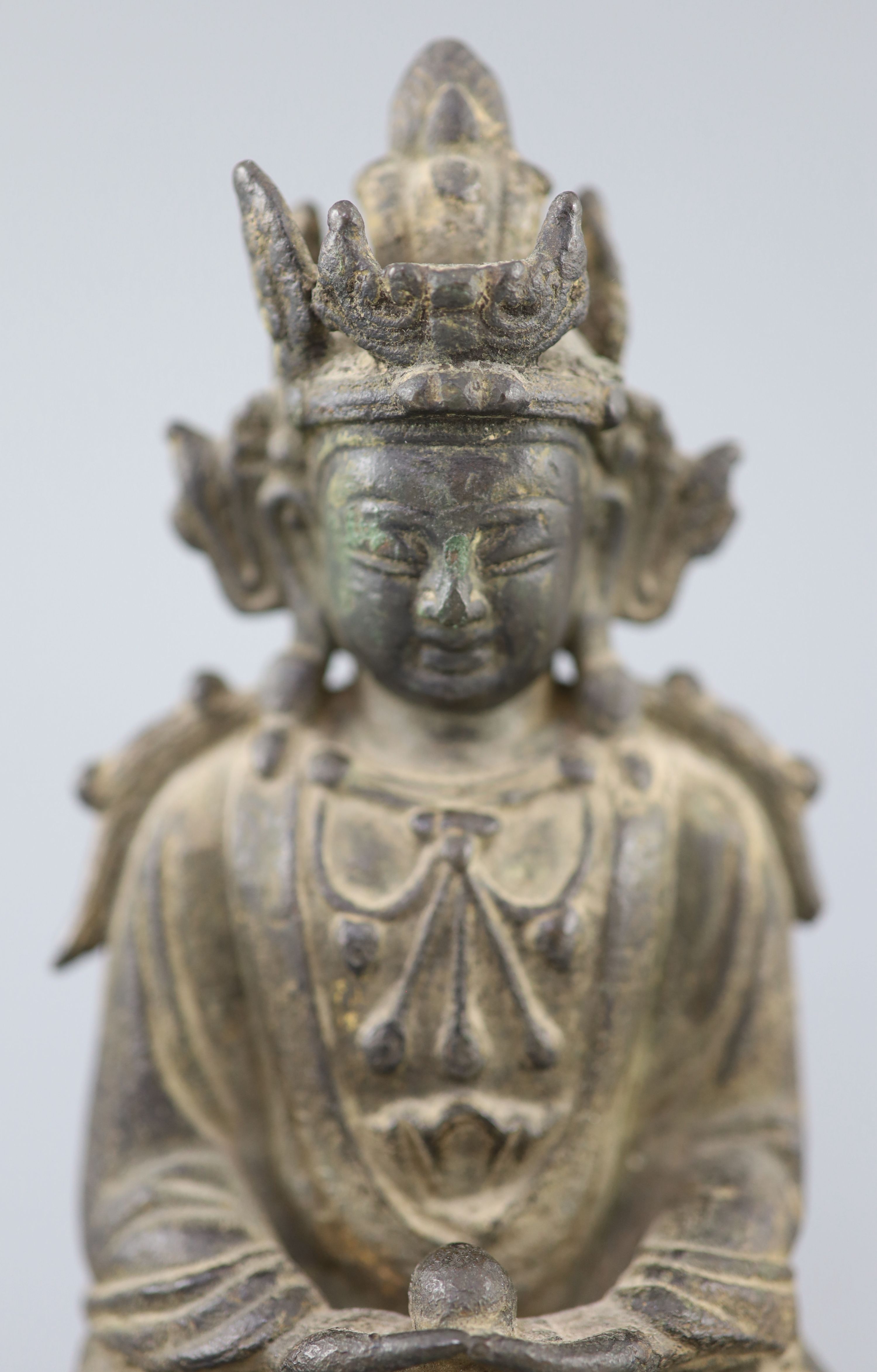 A Chinese bronze figure Amitayus, 17th century, 20cm high, losses to crown